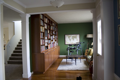 formal living room with bookcases
